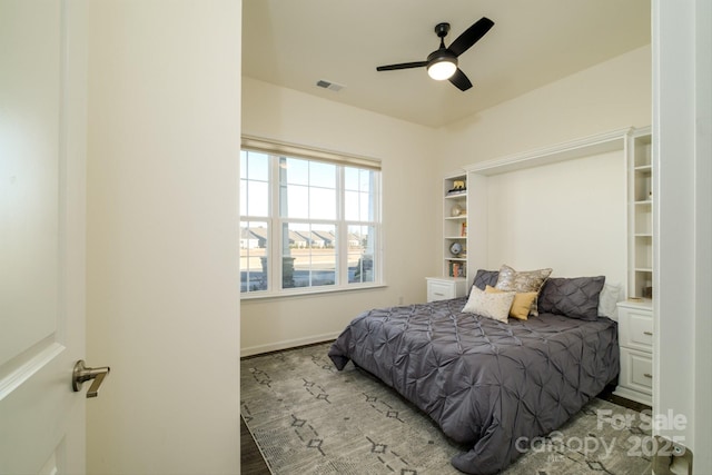 bedroom with ceiling fan and light wood-type flooring