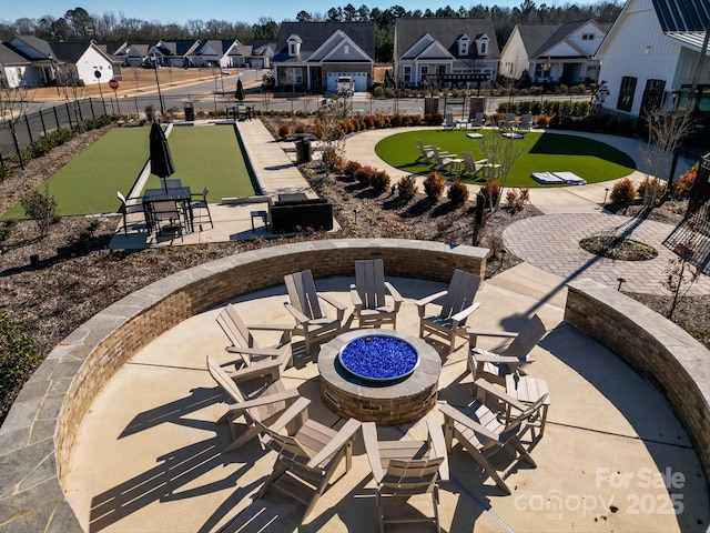 view of patio / terrace with an outdoor fire pit