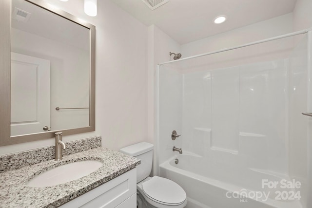 2612 Senior Dr, Charlotte, NC 28216 - bathroom with washtub / shower combination, visible vents, toilet, and vanity