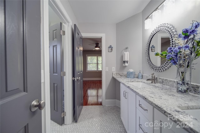 bathroom featuring vanity, ceiling fan, and tile patterned floors