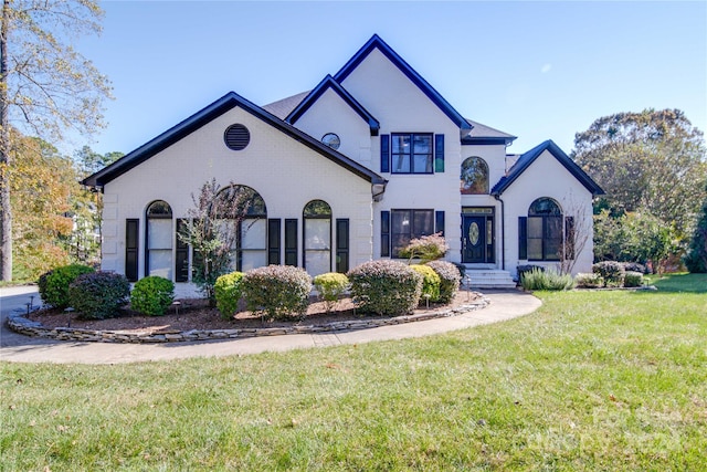 view of front of house with a front lawn