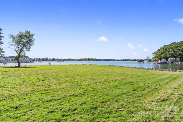 view of yard with a water view