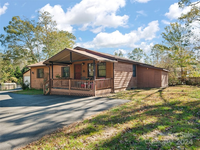 24 Palatka St, Arden, NC 28704 - view of front of property with a porch