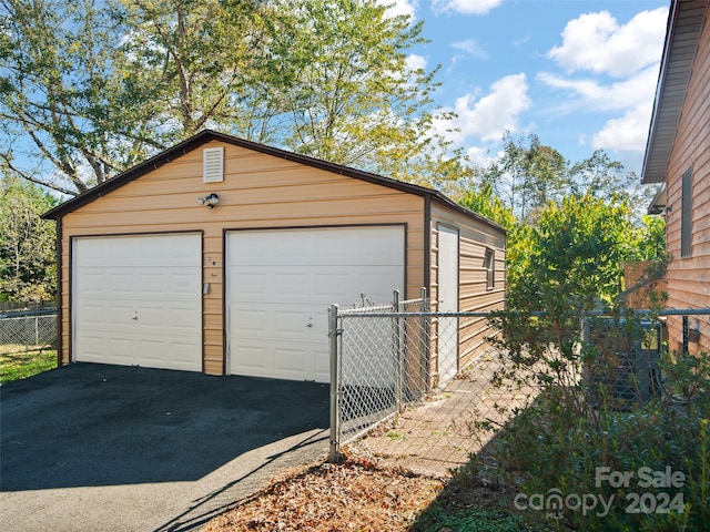 24 Palatka St, Arden, NC 28704 - detached garage featuring fence