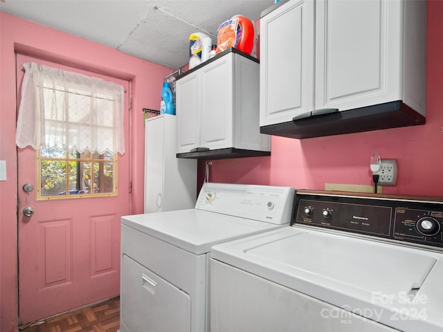 24 Palatka St, Arden, NC 28704 - clothes washing area featuring washer and dryer and cabinet space