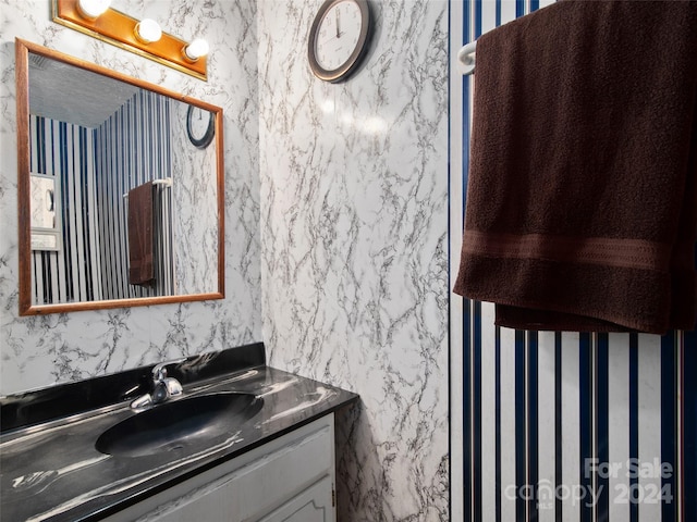 24 Palatka St, Arden, NC 28704 - bathroom with vanity and wallpapered walls