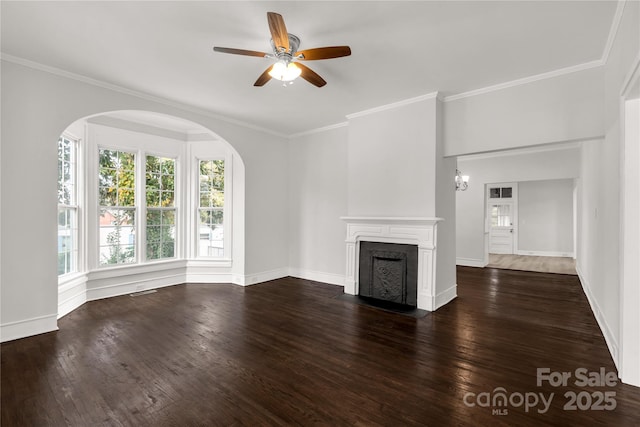 unfurnished living room with a fireplace with flush hearth, dark wood-type flooring, crown molding, and baseboards