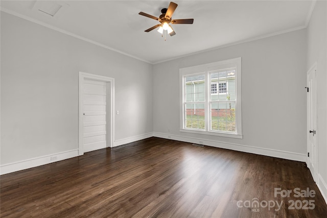 spare room featuring ornamental molding, dark hardwood / wood-style floors, and ceiling fan