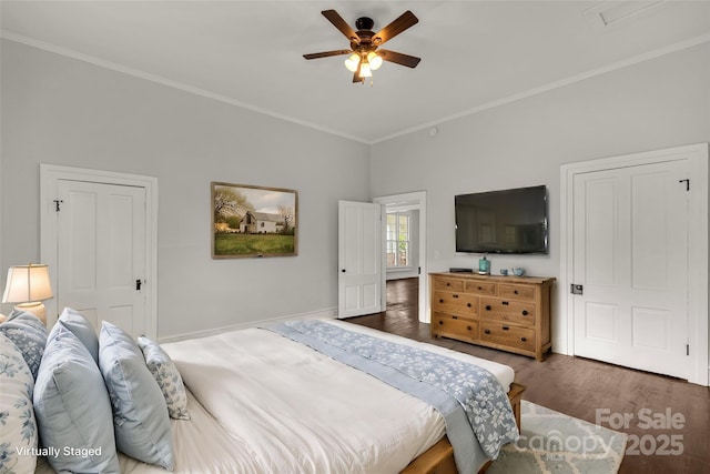 bedroom with dark wood-type flooring, crown molding, baseboards, and a ceiling fan