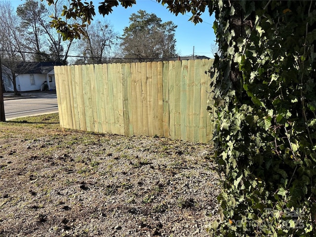 view of outdoor structure featuring fence