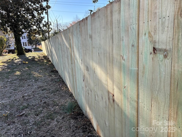 exterior details featuring fence