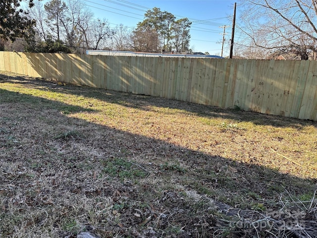 view of yard with fence