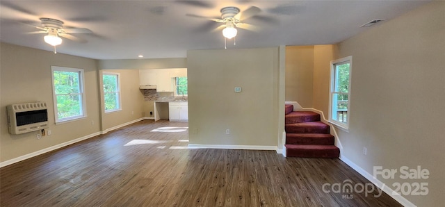 1062 Full Count Ln, Lancaster, SC 29720 - unfurnished living room with heating unit, ceiling fan, dark wood-style floors, and stairs
