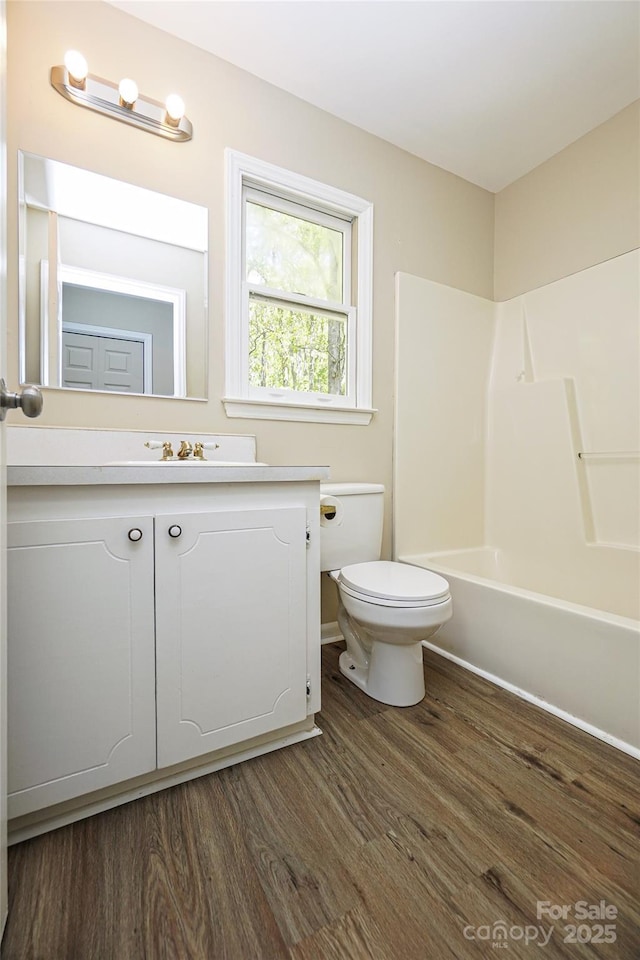 1062 Full Count Ln, Lancaster, SC 29720 - full bath with wood finished floors, toilet, vanity, and  shower combination