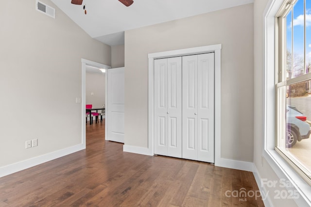 79 Wheeler Rd, Weaverville, NC 28787 - unfurnished bedroom with wood finished floors, baseboards, a closet, and ceiling fan