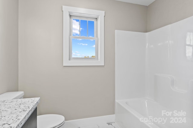 full bathroom with shower / bathing tub combination, vanity, tile patterned floors, and toilet