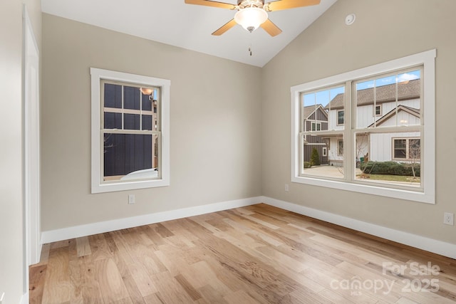 92 Wheeler Rd, Weaverville, NC 28787 - empty room featuring wood finished floors, lofted ceiling, baseboards, ceiling fan, and a smoke detector