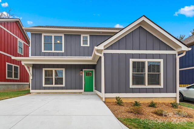 92 Wheeler Rd, Weaverville, NC 28787 - view of front facade with board and batten siding and driveway