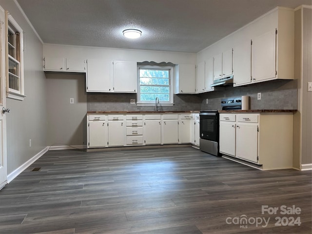 kitchen with white cabinets, backsplash, a textured ceiling, dark hardwood / wood-style floors, and electric stove