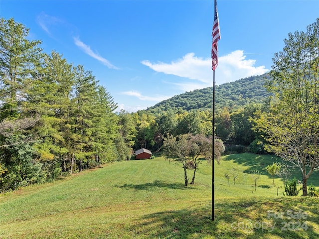 mountain view featuring a rural view