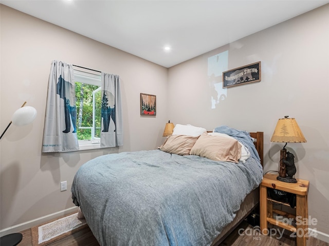 bedroom featuring hardwood / wood-style flooring