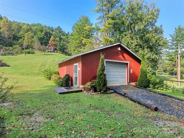 garage with a lawn