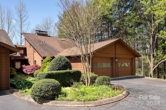 view of front of property with a garage