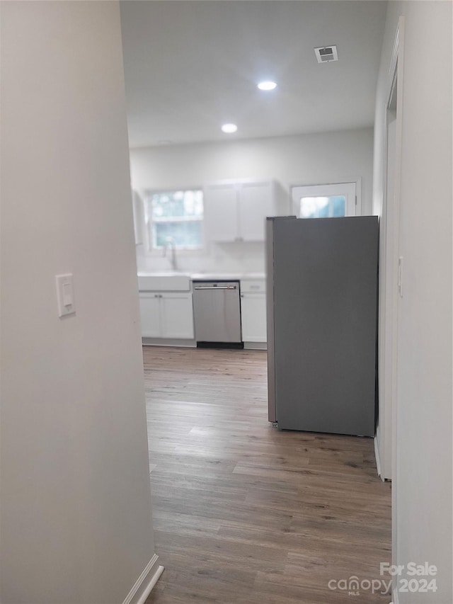 hallway featuring light hardwood / wood-style floors