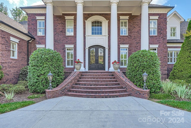 doorway to property with french doors