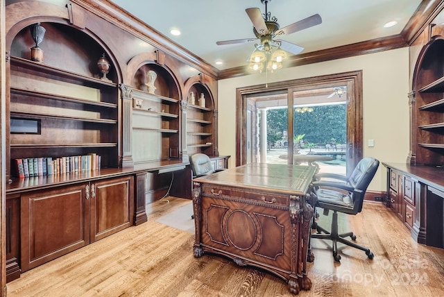 office area with ornamental molding, light wood-type flooring, and ceiling fan