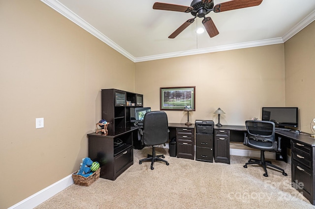 office with crown molding, light carpet, and ceiling fan