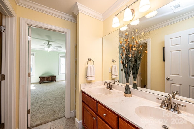 bathroom with vanity, ornamental molding, tile patterned flooring, and ceiling fan