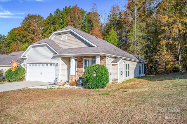 view of front of house with a garage and a front yard