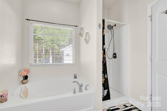 bathroom with independent shower and bath