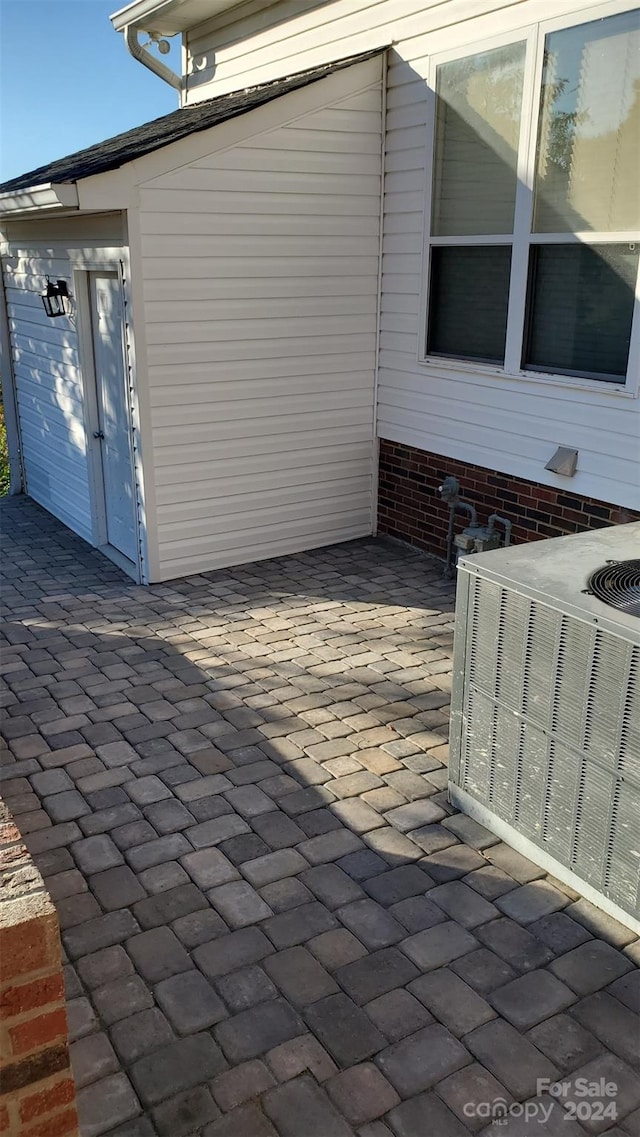 view of patio featuring cooling unit