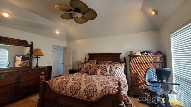 bedroom featuring vaulted ceiling and ceiling fan