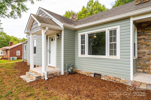 exterior space featuring central AC unit