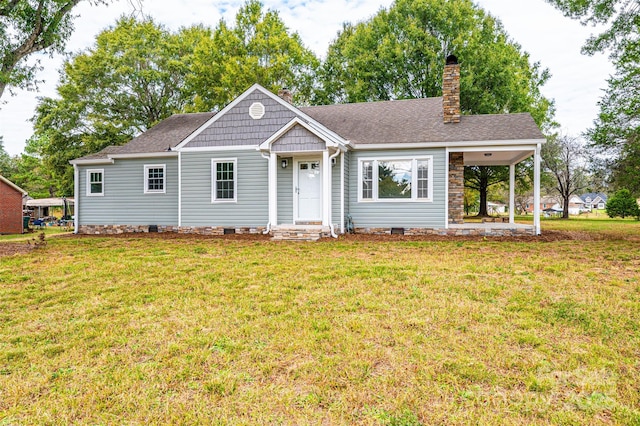 ranch-style home with a front lawn