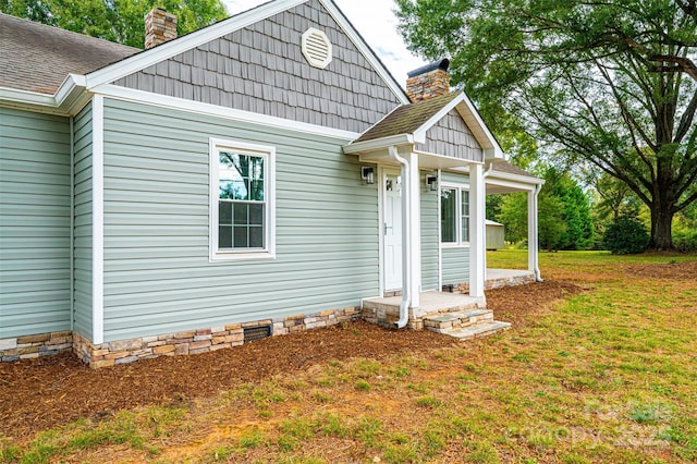 exterior space with a lawn