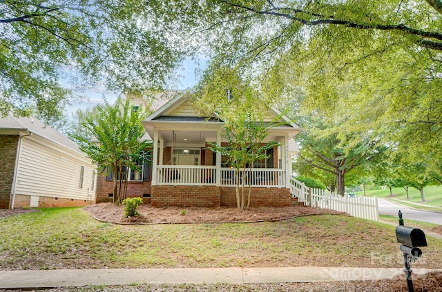 craftsman-style home featuring covered porch