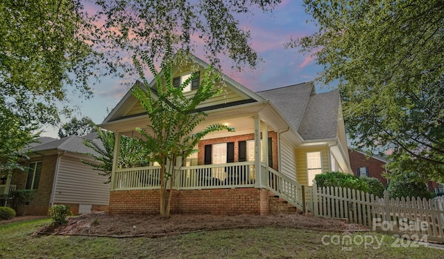 view of front facade featuring covered porch