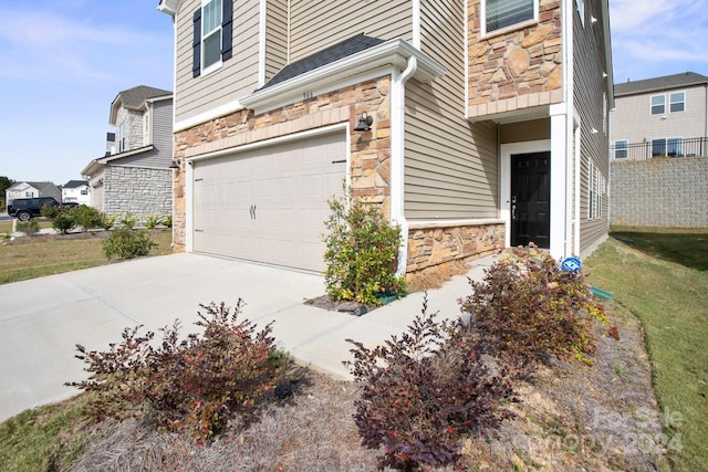 exterior space with a garage