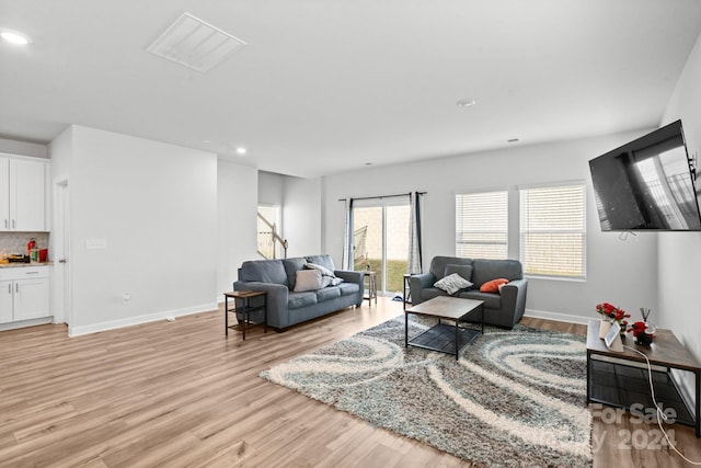 living room featuring light hardwood / wood-style flooring