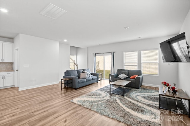 living room featuring light wood-type flooring