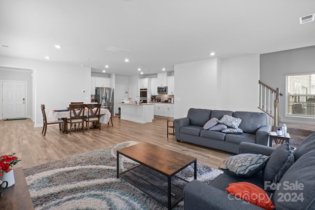 living room featuring light hardwood / wood-style floors