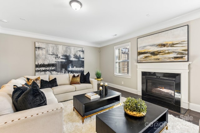 living room featuring hardwood / wood-style flooring and ornamental molding