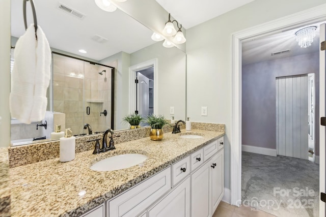 bathroom featuring vanity and walk in shower