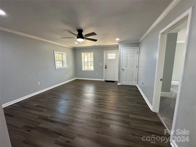 foyer entrance featuring crown molding, ceiling fan, and dark hardwood / wood-style flooring