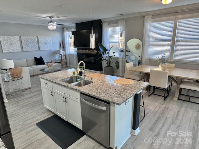 kitchen with dishwasher, light hardwood / wood-style flooring, a center island with sink, sink, and white cabinets