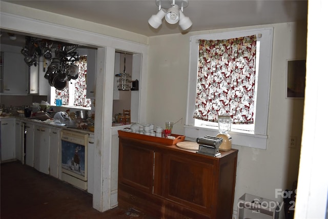 kitchen featuring white dishwasher